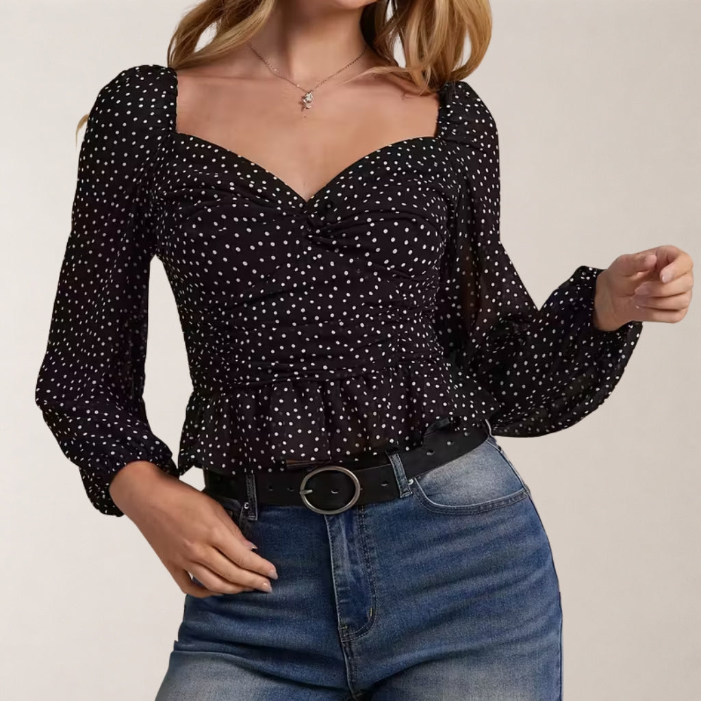 Elegante damesblouse met boothals en pofmouwen