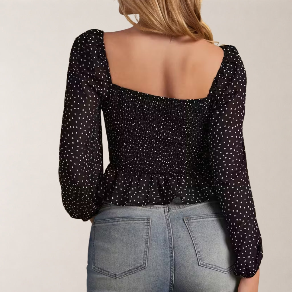 Elegante damesblouse met boothals en pofmouwen